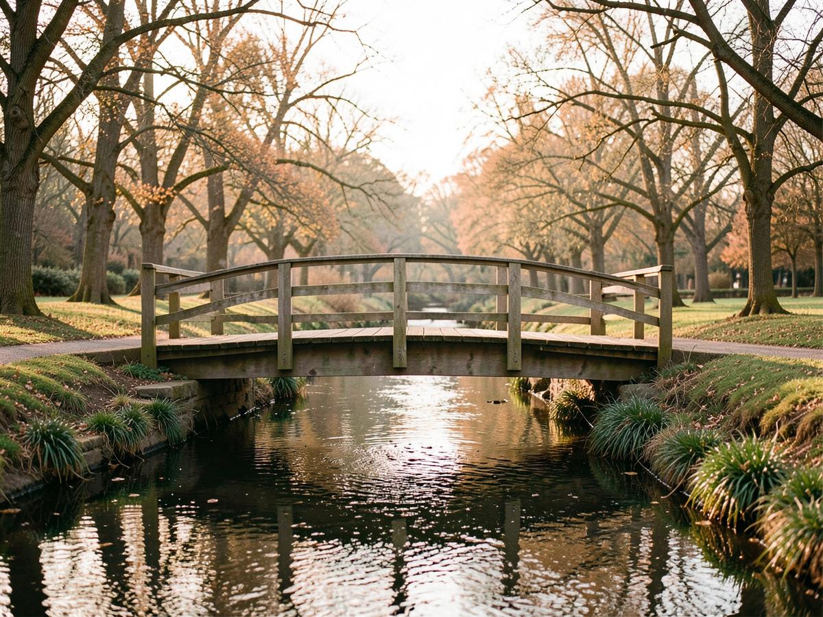 Ponte de madeira sobre um riacho tranquilo em um parque